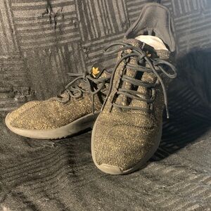 Adidas Woman’s Tubular Shadow Black and Gold Glitter Knit Sneakers